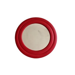 Vintage wall mirror in a leatherette frame image 1