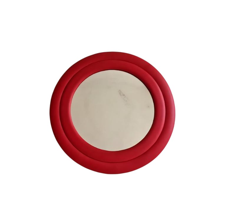 Vintage wall mirror in a leatherette frame image 1