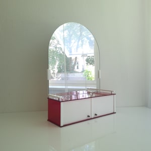 Vintage Postmodern wall mirror with plexiglass shelf