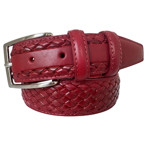 May include: A red leather belt with a braided design and a silver buckle.