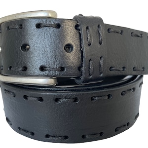 May include: A black leather belt with a silver buckle and black stitching. The belt is rolled up and the buckle is visible.