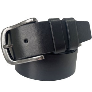 May include: A black leather belt with a silver buckle. The belt is folded in half, showing the buckle and the leather strap.