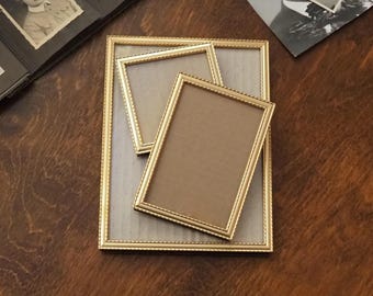 Set van drie vintage fotolijsten | Vintage fotolijstjes | Bijpassende vintage lijsten | Vintage goudkleurige lijst | Vintage kaderset