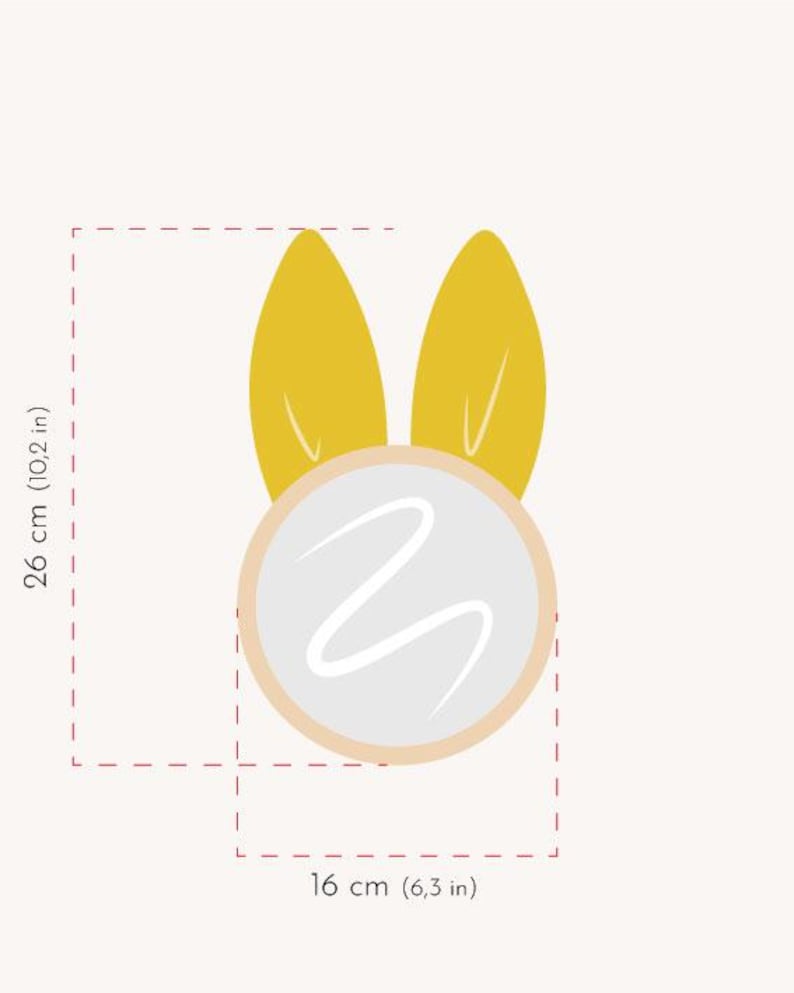 May include: A whimsical illustration of a bunny face with yellow ears and a white face with a wavy design. The bunny is 10.2 inches tall and 6.3 inches wide.