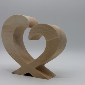 Wooden decoration heart made of pine wood