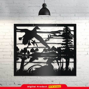 May include: Black metal wall art featuring a silhouette of a duck flying over a lake with trees and a sunset in the background.