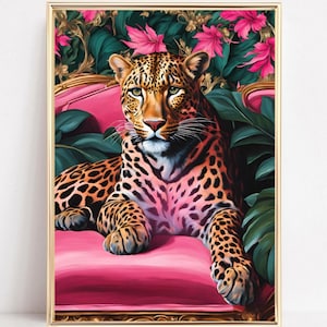 May include: A leopard with a spotted coat sits on a pink velvet chair with green leaves and pink flowers in the background.