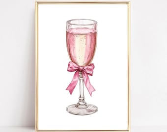 May include: A glass of pink champagne with a pink ribbon tied around the stem. The glass is on a white background.