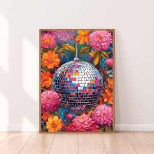 May include: A silver disco ball surrounded by colorful flowers, including pink, orange, and yellow. The flowers are painted in a realistic style.