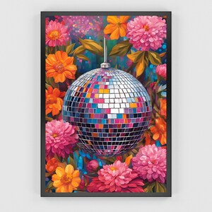 May include: A silver disco ball surrounded by colorful flowers, including pink, orange, and yellow. The flowers are in bloom and have a vibrant, almost psychedelic appearance.