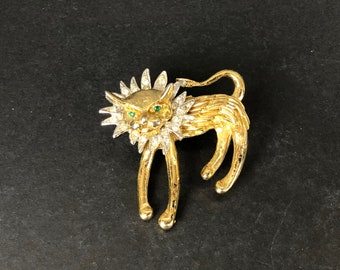 Broche chat / lion vintage avec yeux et crinière en cristal verts