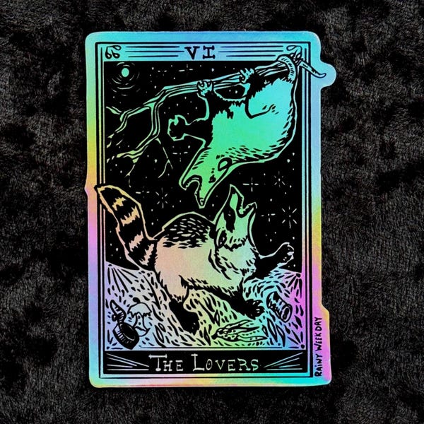 Appalachian Tarot: Possum and Raccoon Fighting Over Trash - The Lovers Holographic Sticker