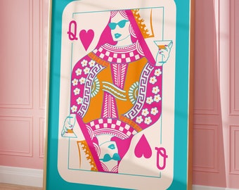 May include: A framed illustration of the Queen of Hearts playing card. The queen is wearing sunglasses and a crown and holding a martini glass. The card is on a turquoise background with a gold frame.