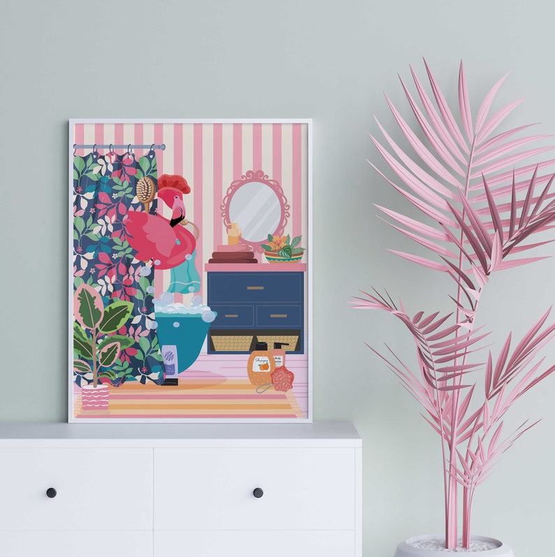 May include: A pink flamingo taking a bath in a white bathtub with a floral shower curtain. The bathroom has a pink and white striped wall, a blue vanity with drawers, and a round mirror with a gold frame.