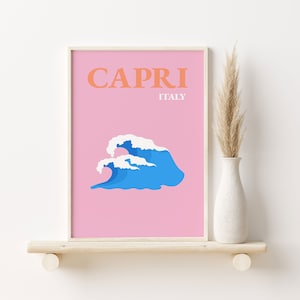 May include: A pink and white printable wall art print with the text "CAPRI ITALY" and a blue wave graphic.