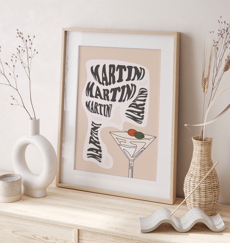 May include: A beige poster with the word "MARTIN" repeated in a swirling, psychedelic font. A martini glass with an olive and a cherry is depicted in the centre of the poster.
