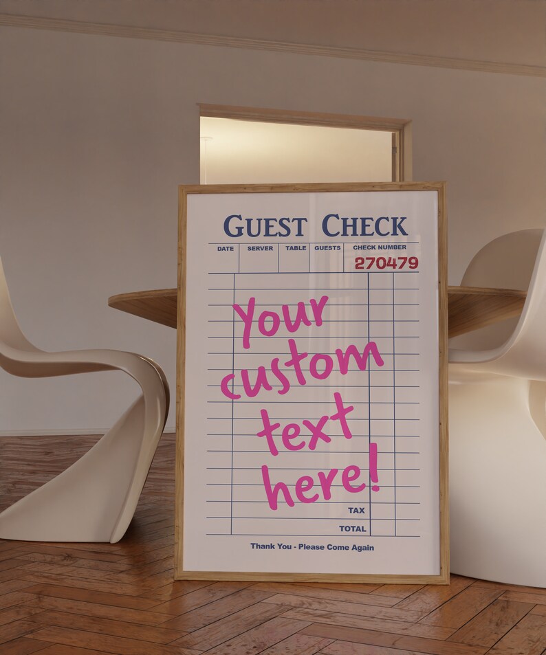 May include: A white guest check with a wooden frame. The check has a blue header that says "GUEST CHECK" and includes columns for date, server, table, guests, and check number. The check number is 270479. The text "Your custom text here!" is written in pink cursive.
