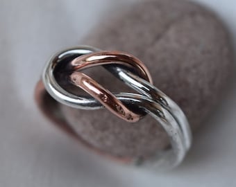 love knot ring in copper and silver