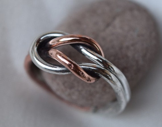 love knot ring in copper and silver