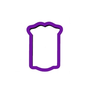 May include: A purple cookie cutter in the shape of a slice of bread. The cutter has a scalloped top edge and a rectangular body with rounded corners. The outline is a vibrant purple with a black inner edge.