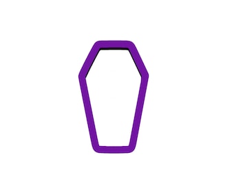 May include: Purple coffin-shaped cookie cutter.