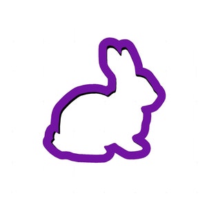 Puede incluir: Un contorno morado de una silueta de conejo.
