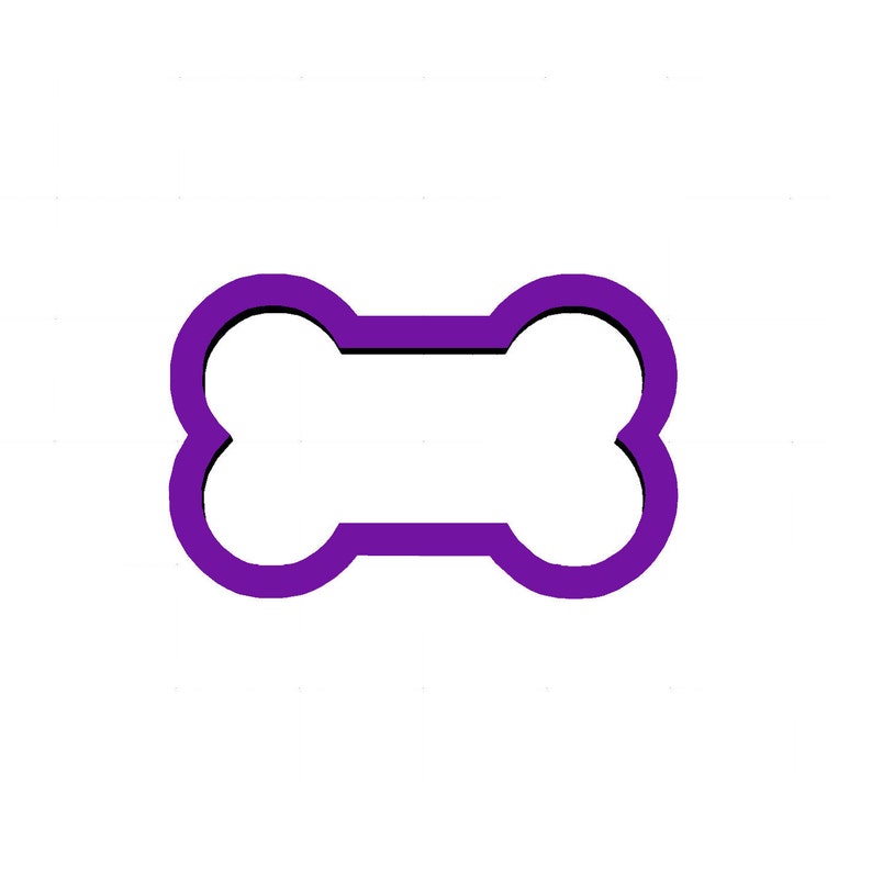 May include: A purple bone-shaped cookie cutter.
