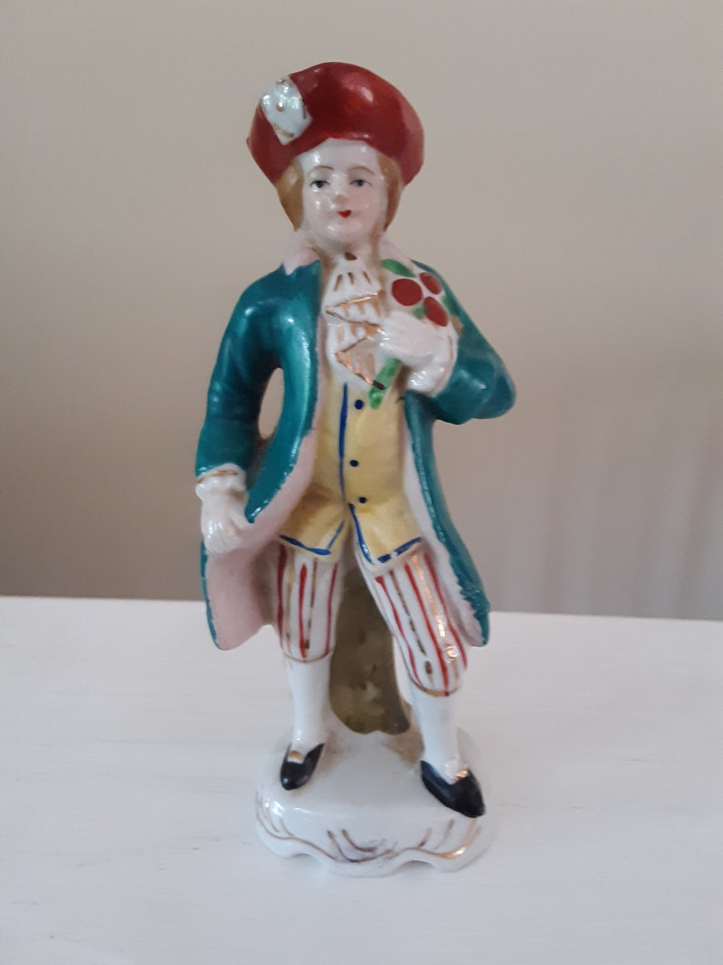 Handpainted Japan Colonial Man Carrying a Bouquet of Flowers