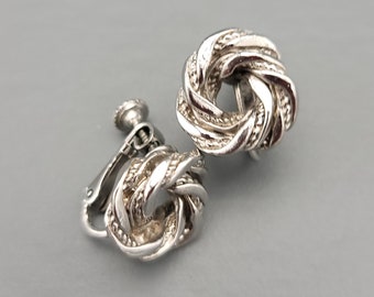Small lot of silver tone metal screw back earrings knot earrings rhinestone and heart screw back earrings