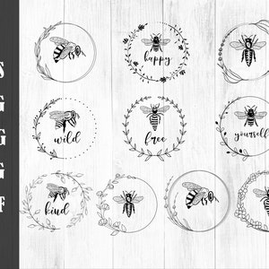 May include: Set of nine black and white bee illustrations with floral wreaths. Each wreath has a different word inside: "happy", "wild", "free", "yourself", "kind", "be", "love", "strong", and "brave".