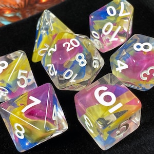 Spell Song DnD Dice Set for Dungeons and Dragons | D20 TTRPG Polyhedral Dice Set | Resin Swimming with Magical Colors!