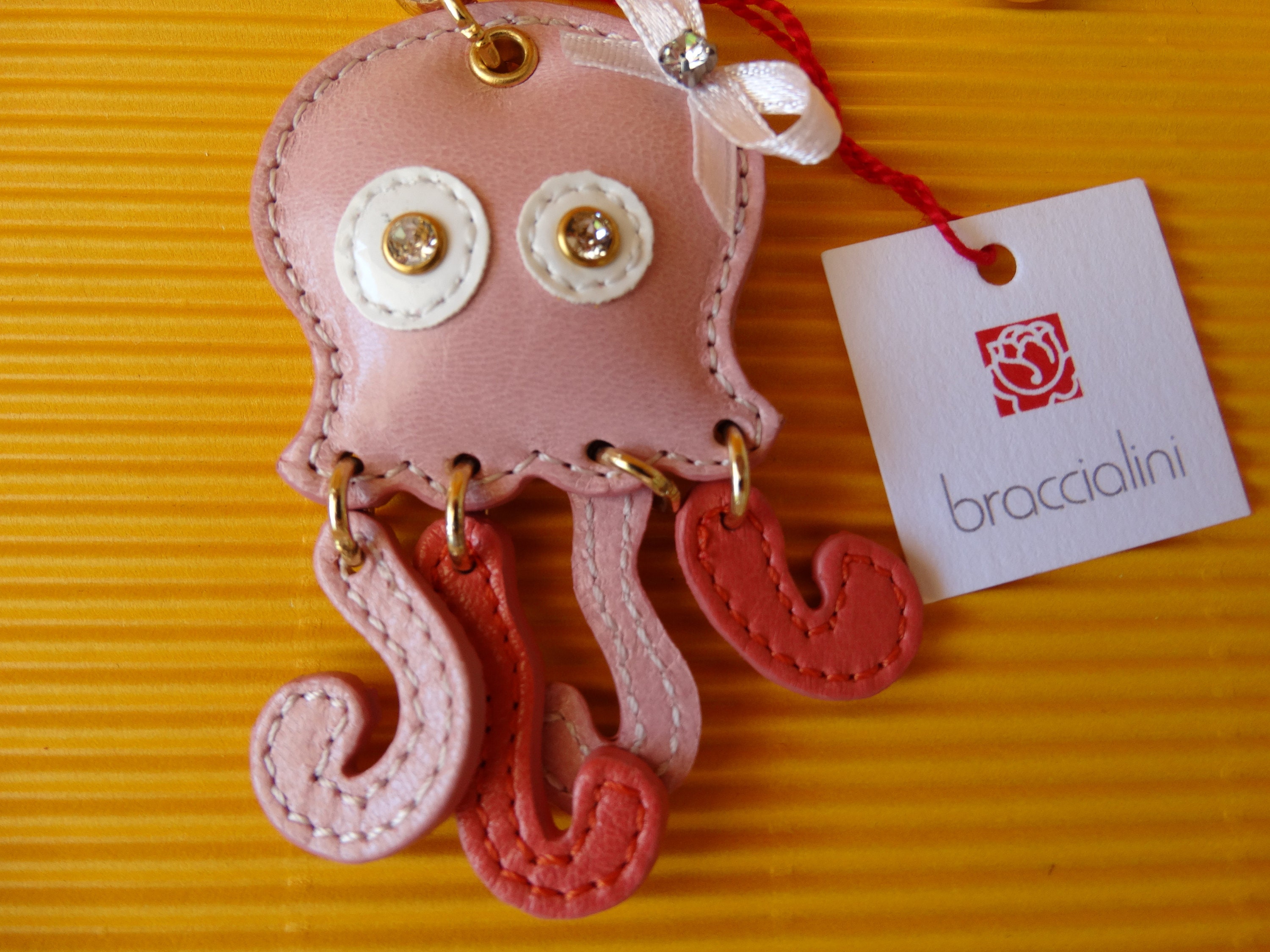 Portafoglio in pelle con portachiavi personalizzato e braccialetto con