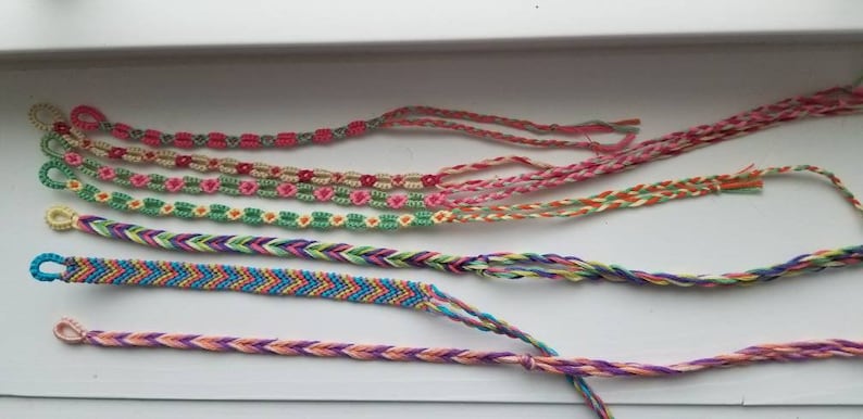 Thin colorful handmade knotted daisy chain friendship bracelets