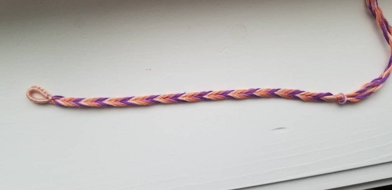 Thin colorful handmade knotted daisy chain friendship bracelets