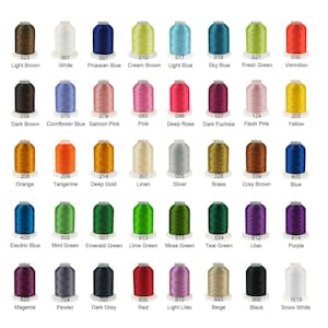 a collection of various colored thread spools, each with a unique color and pattern.