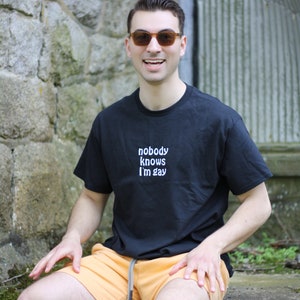 Nobody Knows I&#39;m Gay Unisex Embroidered T-Shirt or Crewneck Sweatshirt