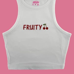 Fruitige geborduurde tanktop of baby-T-shirt