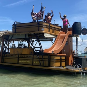 Pontoon bar. Weatherproof all PVC tiki bar, epoxy resin art bar top, storage cabinets. Custom made to fit your boat. Perfect for pool patio.