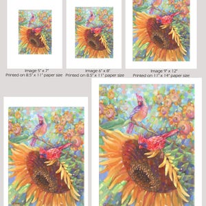 May include: A painting of two red cardinals perched on a sunflower. The sunflower is in bloom and has a bright yellow center with brown seeds. The background is a blur of pink and green flowers.