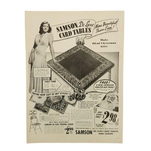 May include: Vintage advertisement for Samson De Luxe card tables and folding chairs. The ad features a woman in a dress, a card table with a patterned border, and a Santa Claus illustration. The text includes "Ideal Christmas Gifts."
