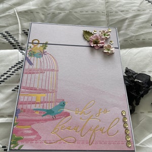 Chipboard photo album made with “Oh so beautiful” paper