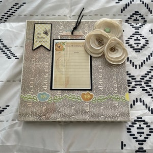 Chipboard photo double folio album made with “The Knees Bees” paper