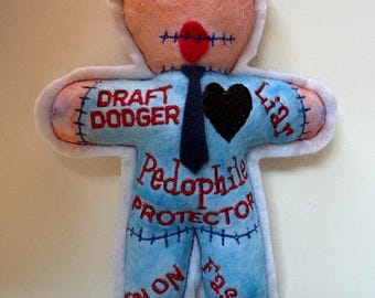 Orange face poppet voodoo doll pincushion