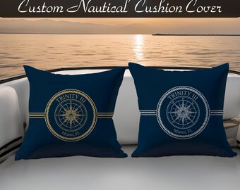 May include: Two navy blue nautical cushion covers with compass rose designs. One has a gold compass rose and the other has a white compass rose. The text "Custom Nautical Cushion Cover" is at the top. The bottom text says "12 COLOR COMBINATIONS - INSERT NOT INCLUDED".