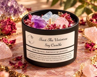 May include: A black soy candle in a cylindrical container with a white label reading Trust The Universe Soy Candle, Rose Quartz, Amethyst & Celestite. The wax is topped with dried red rose petals and raw crystals including amethyst and rose quartz.
