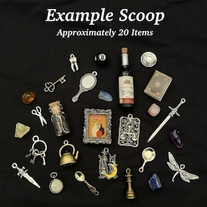 May include: A collection of approximately 20 miniature charms and trinkets including a wine bottle, a framed picture, a sword, a dragonfly, a key, a mirror, a teapot, a spoon, a chess piece, a clock, scissors, a tooth, and various colored stones.