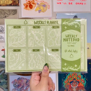 Spooky Curio Cabinet Weekly Planner - Notepad