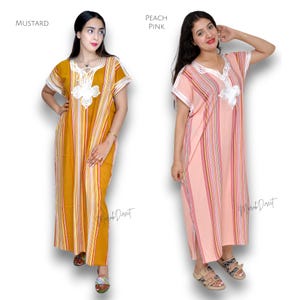 May include: Two floor-length kaftans, one in mustard yellow and one in peach pink. Both feature vertical multicolored stripes, short sleeves, and white embroidered detailing around the V-neckline. The text "MUSTARD" and "PEACH PINK" appear above each.