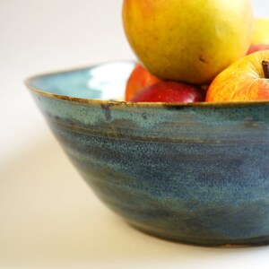 Beautiful hand-made unique ceramic bowl in an extraordinary variety of colors in a modern design as decoration or for fruit, chocolates