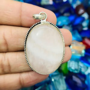 Oval Rose Quartz Pendant: 92.5 Sterling Silver, 2 Inch